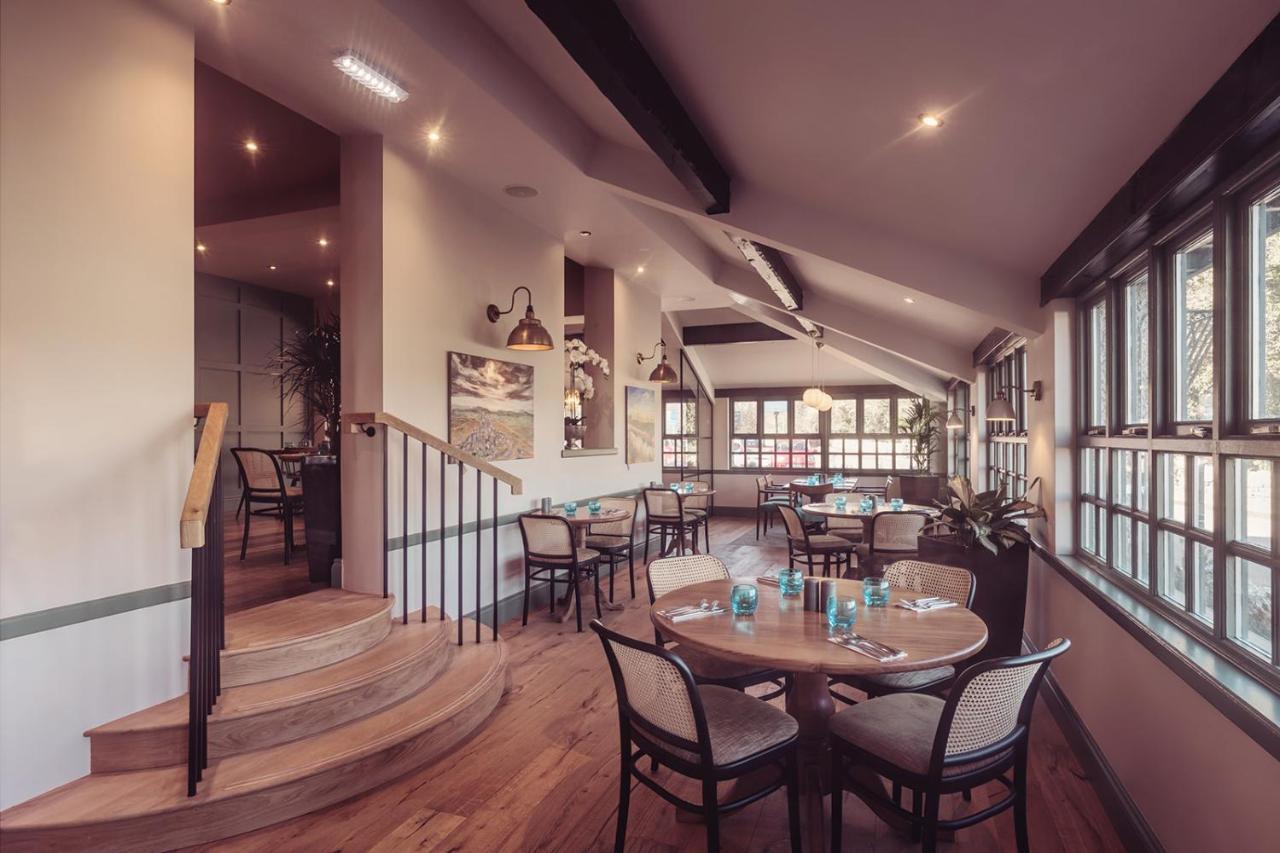 Longlands Inn & Cottages Carnforth Bagian luar foto The restaurant at the hotel