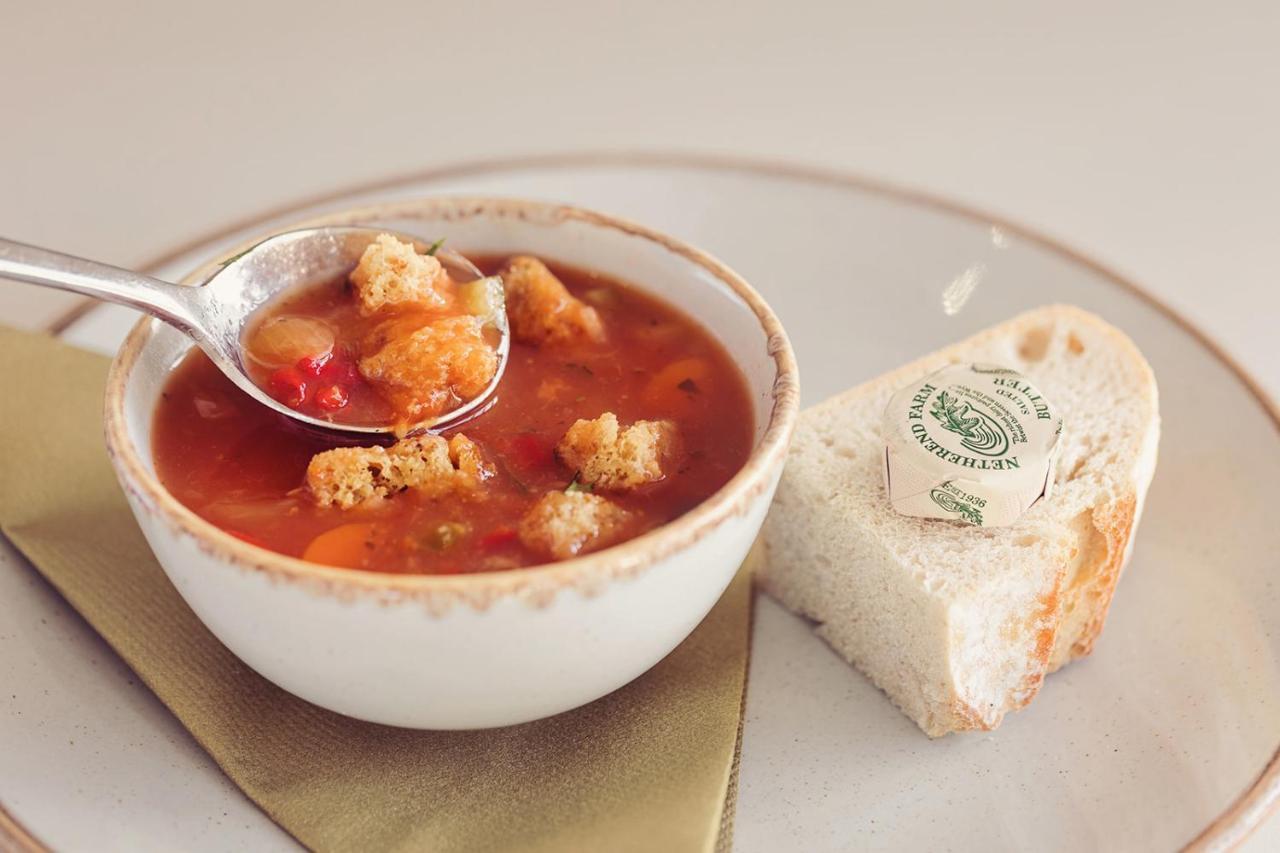 Longlands Inn & Cottages Carnforth Bagian luar foto A bowl of soup with a bread roll