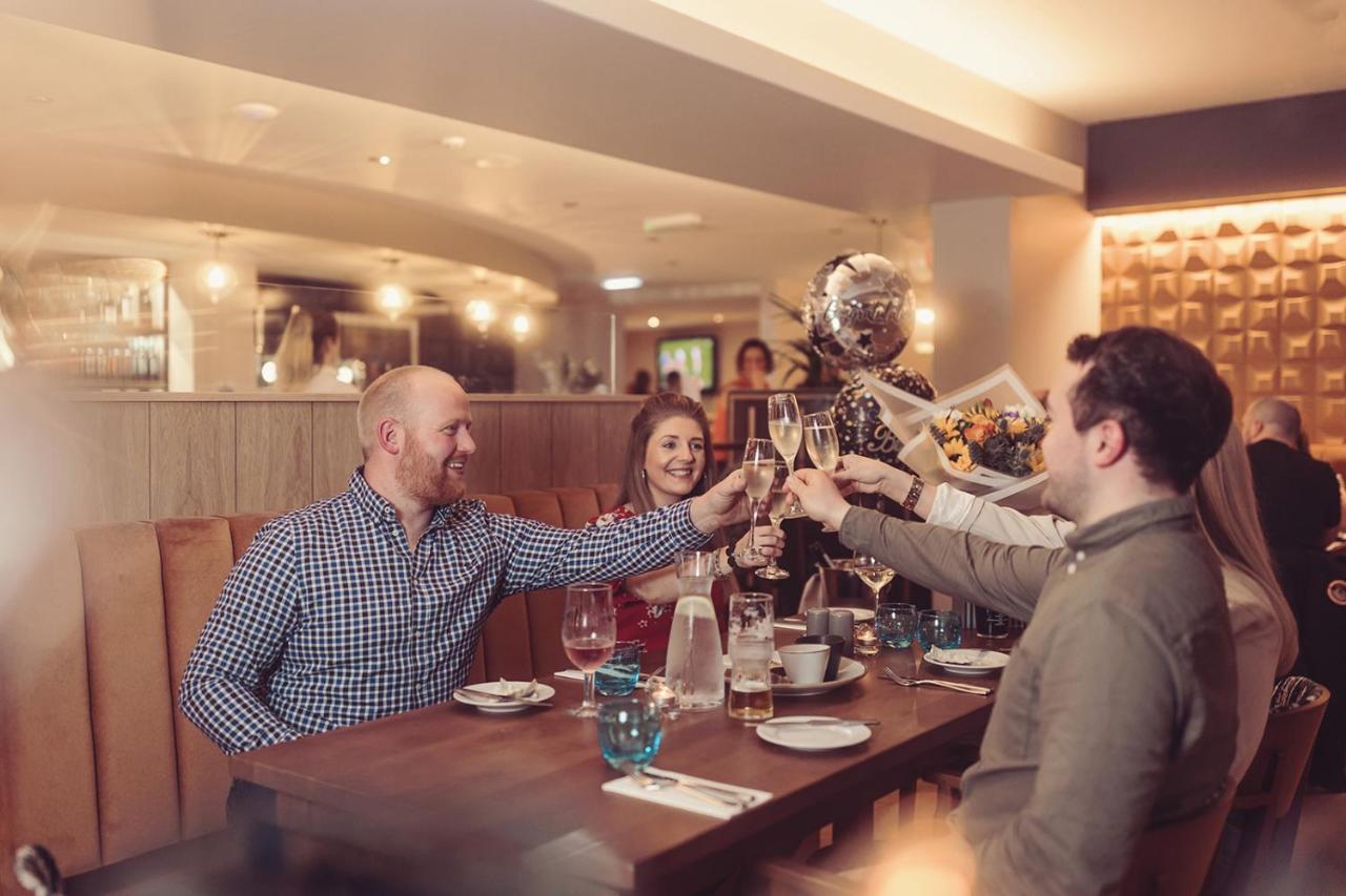 Longlands Inn & Cottages Carnforth Bagian luar foto The restaurant at the hotel