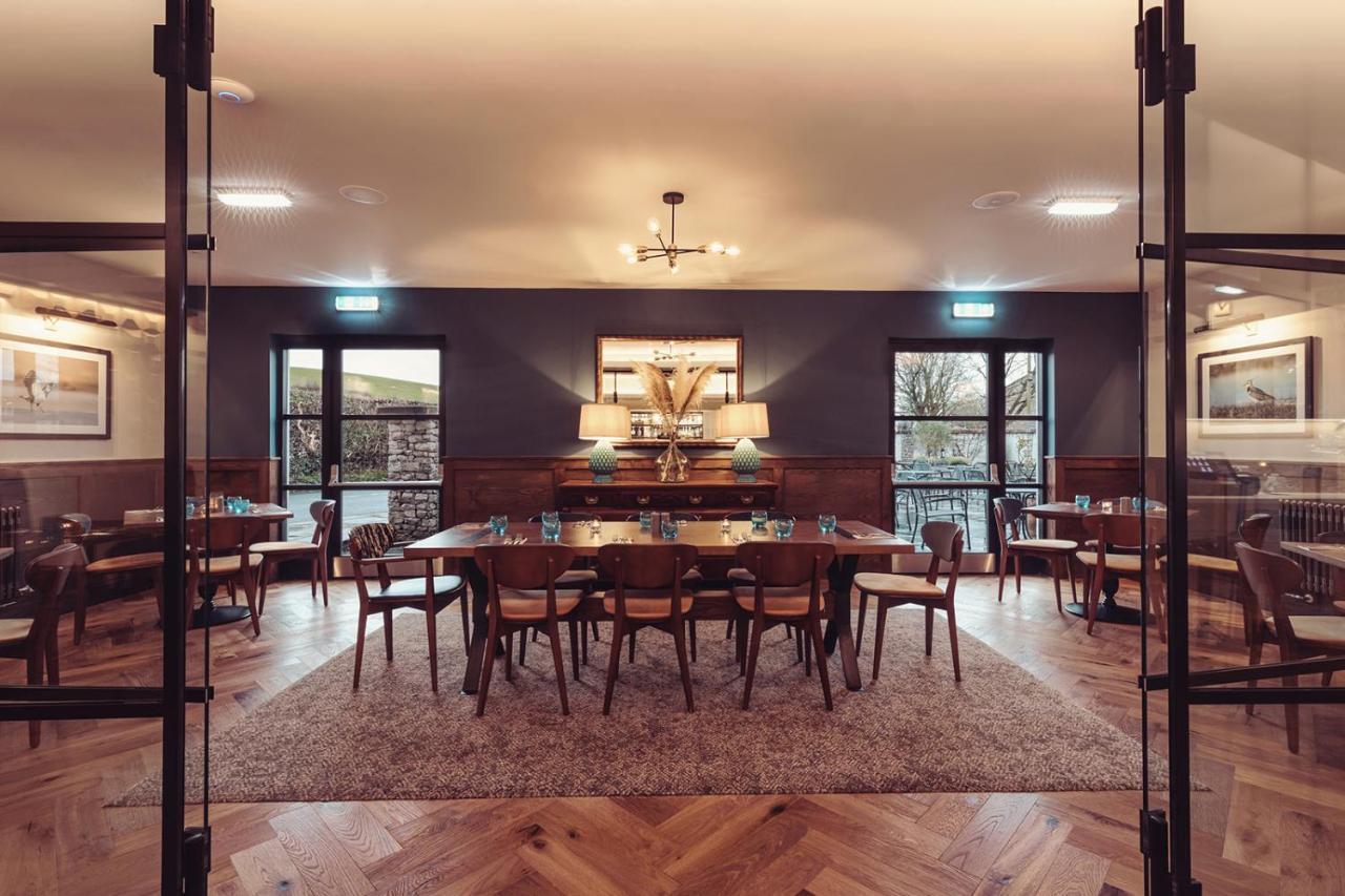 Longlands Inn & Cottages Carnforth Bagian luar foto The restaurant at the hotel