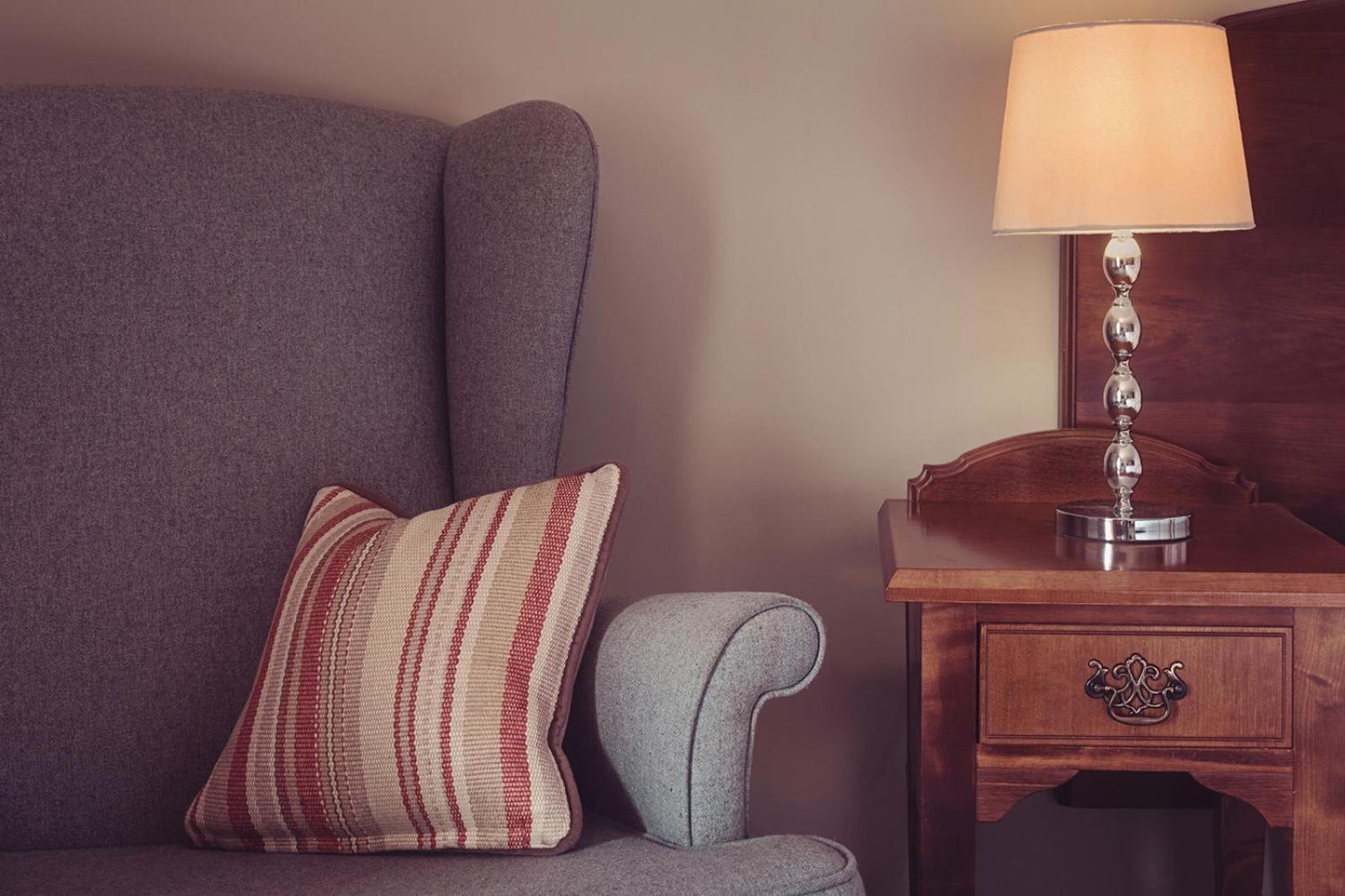 Longlands Inn & Cottages Carnforth Bagian luar foto A throw pillow on a sofa